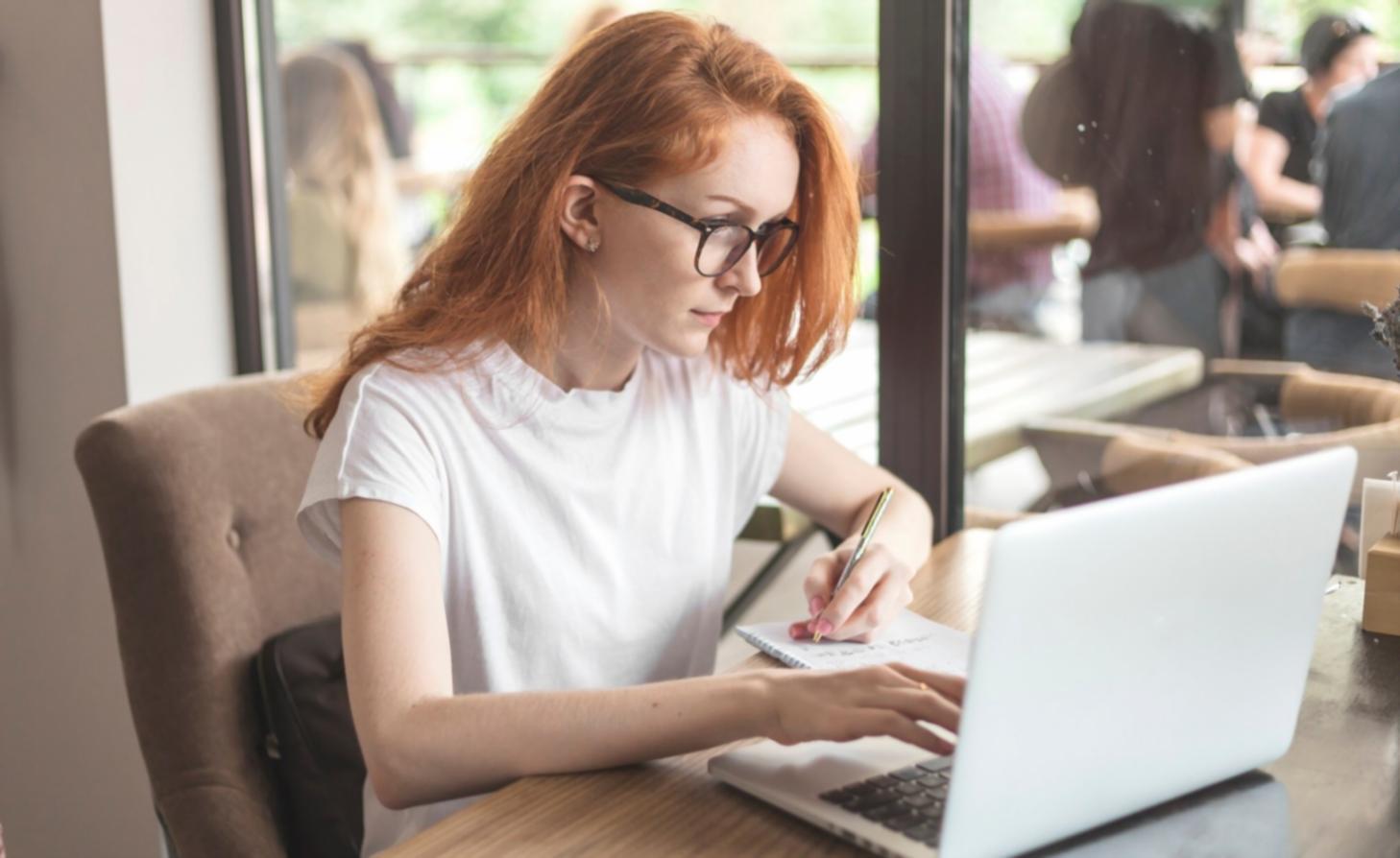 Person reviewing financial goals and savings progress on laptop